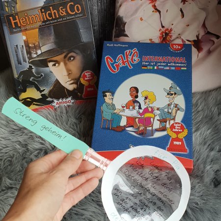 Heimlich und Co., Cafe International AMIGO Spiele